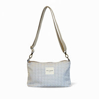 DE LA MUR Vison gingham jacquard clutch bag in beige and off-white, front view with strap