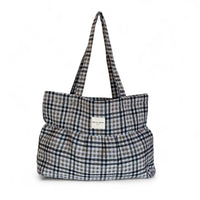 DE LA MUR Lian check jacquard ruffle tote bag in black and beige, front view