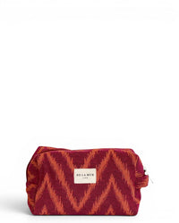 DE LA MUR Fuego zigzag jacquard makeup bag in pink and orange, front view