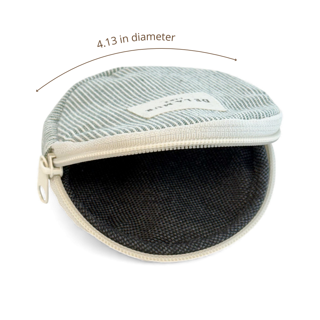 Open DE LA MUR striped coin purse showing lined interior, 4.13 in diameter
