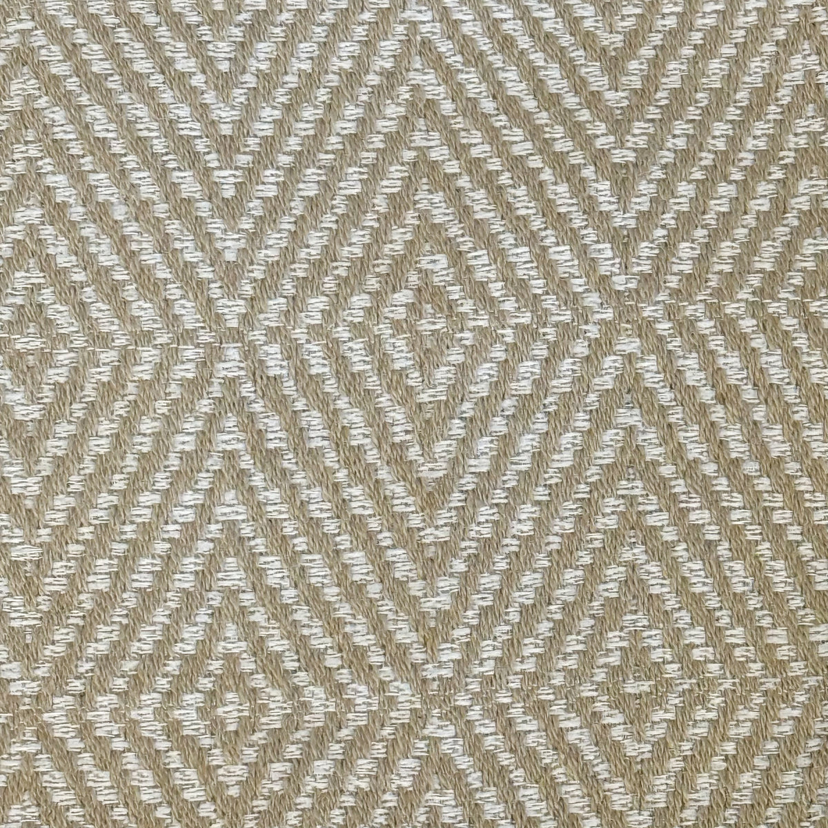 Close-up of the off-white geometric diamond jacquard fabric of the DE LA MUR Arena bag