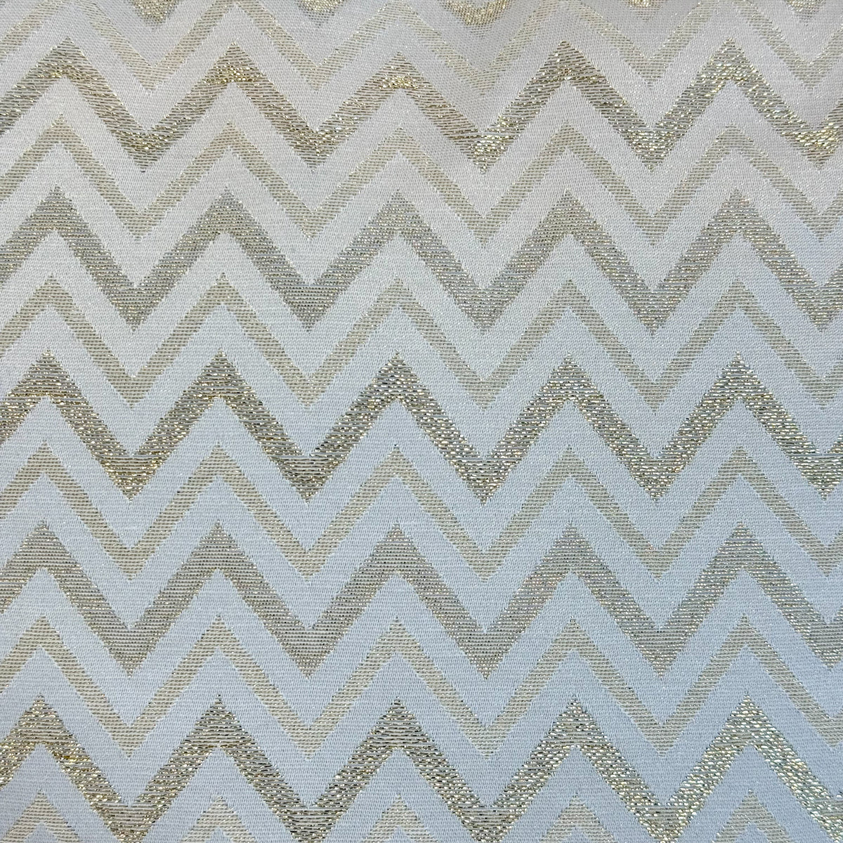 Close-up of the gold metallic zigzag jacquard fabric, DE LA MUR