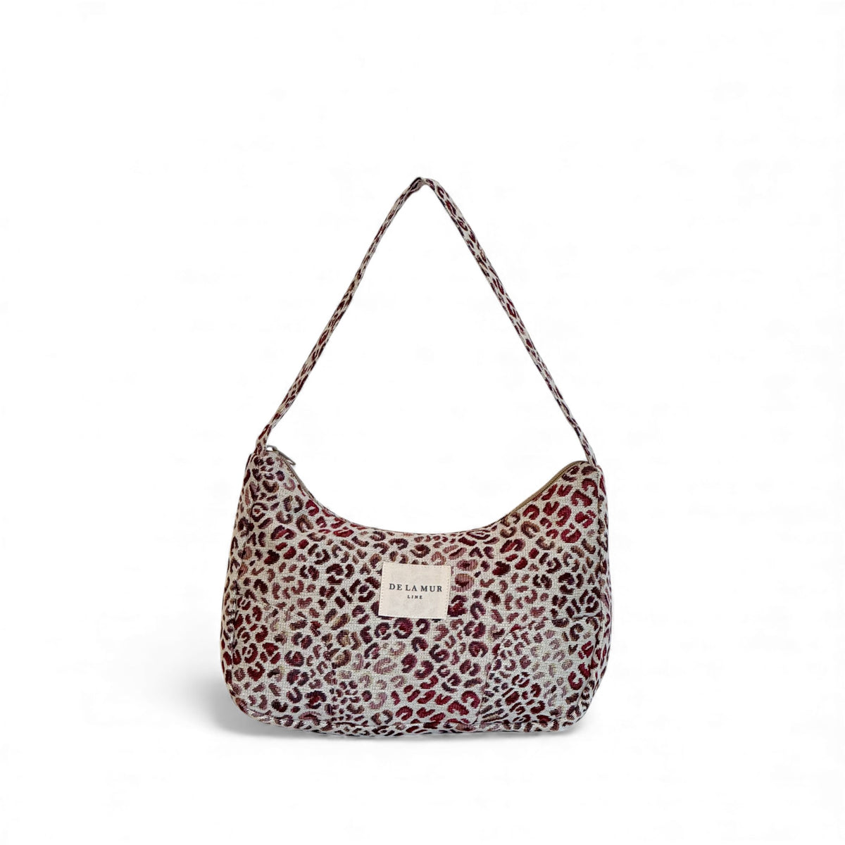 DE LA MUR Talco animal print jacquard shoulder bag, front view with strap