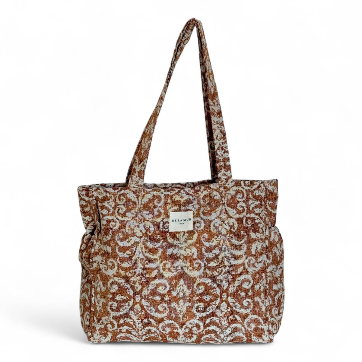 DE LA MUR geometric jacquard zippered tote bag in rust, front view