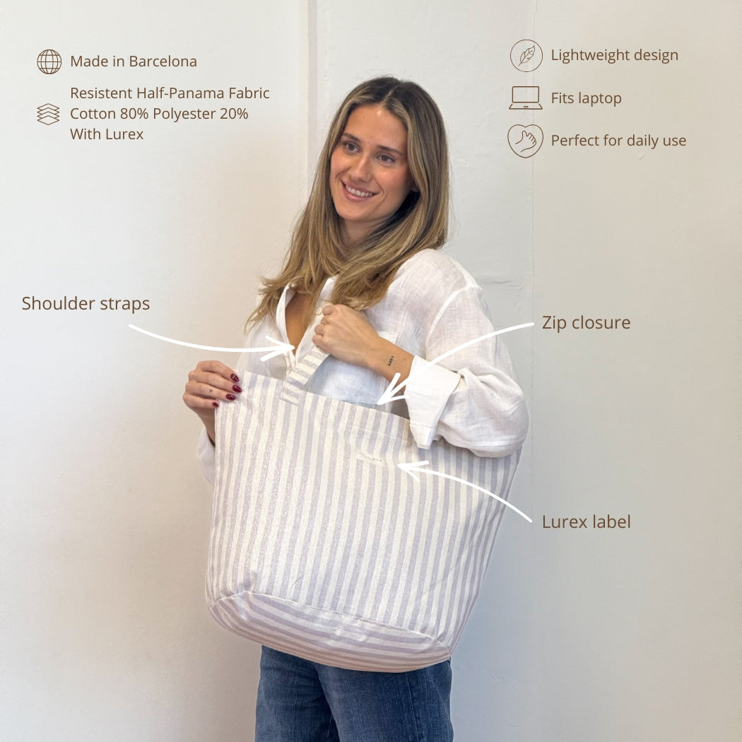 Model holding the DE LA MUR lilac striped tote bag, features infographic