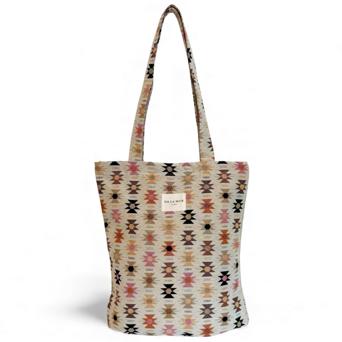 DE LA MUR Royal geometric jacquard zippered bag in cream with pink motifs, front view