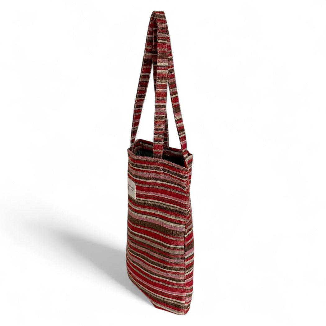 DE LA MUR Pita striped tote bag side view showing depth and long shoulder handles