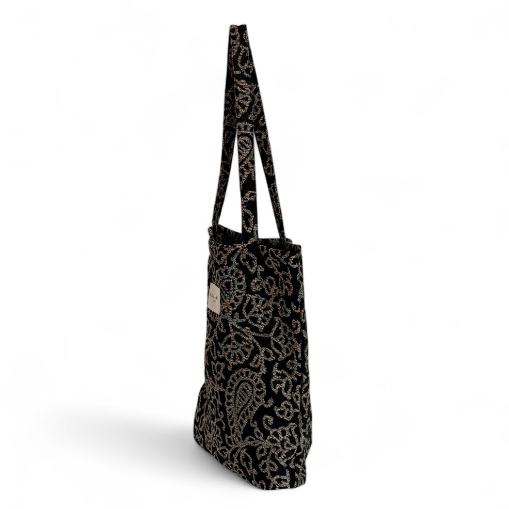 Side view of the DE LA MUR Teide floral paisley jacquard tote bag