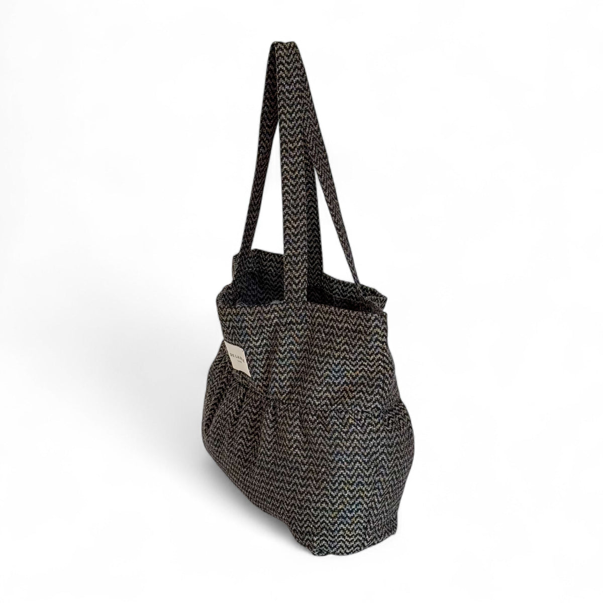DE LA MUR Dana zigzag jacquard tote bag, three-quarter side view with long straps