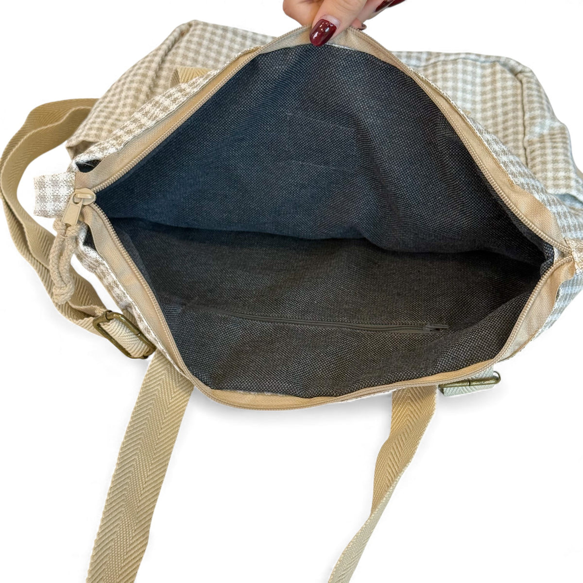 Open DE LA MUR Vison backpack tote showing the lined gray interior