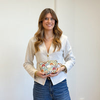 Model with the DE LA MUR Floral Jacquard Small Makeup Bag – Multicolor (Flora)
