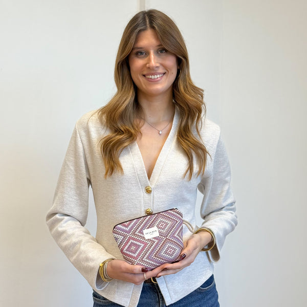 Model with the DE LA MUR Geometric Jacquard Small Makeup Bag – Pink & Lilac (Nana)