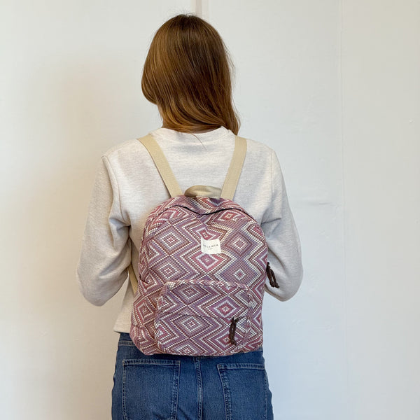 Model with the DE LA MUR Geometric Jacquard Backpack – Pink & Lilac (Nana)