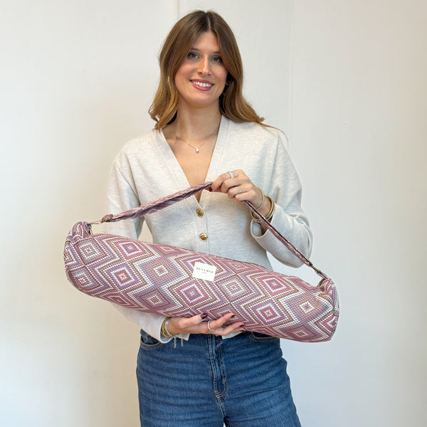 Model with the DE LA MUR Geometric Jacquard Yoga Mat Bag – Pink & Lilac (Nana)