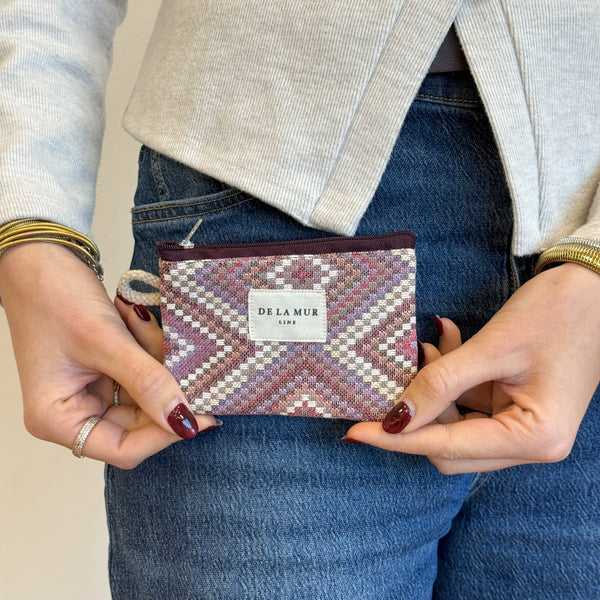 Model with the DE LA MUR Geometric Jacquard Coin Purse – Pink & Lilac (Nana)
