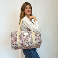 Model with the DE LA MUR Leopard Jacquard Sports Bag – Burgundy & Cream (Talco)