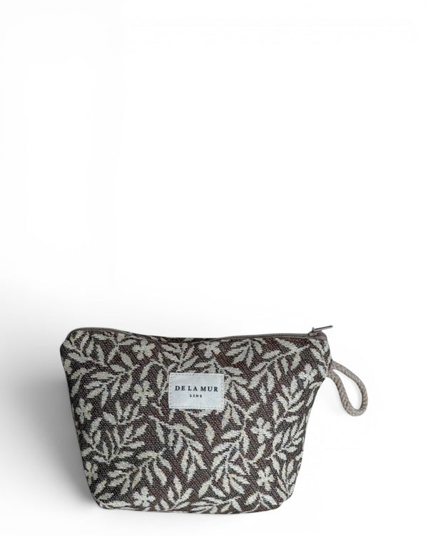 DE LA MUR Plan floral jacquard small makeup bag in beige and cream, front view with wrist loop