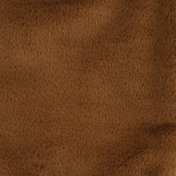 Close-up of the soft camel brown faux fur texture, DE LA MUR