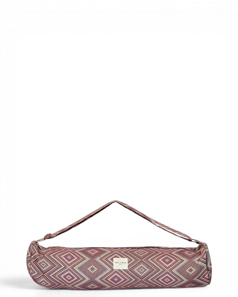 DE LA MUR Nana jacquard yoga mat bag in pink and lilac diamonds, front view with strap